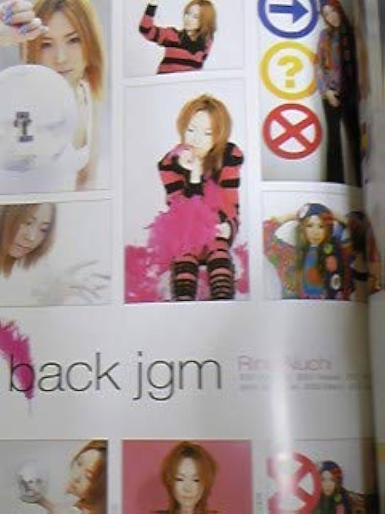 Amazon.co.jp: 愛内里菜写真集 made in RINA 2002 帯付き
